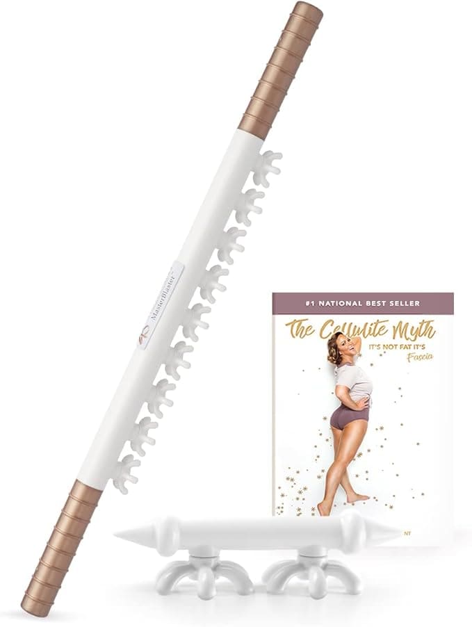 White cellulite massage tool with book.