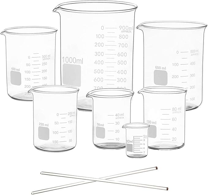 Set of glass beakers with stirring rods.