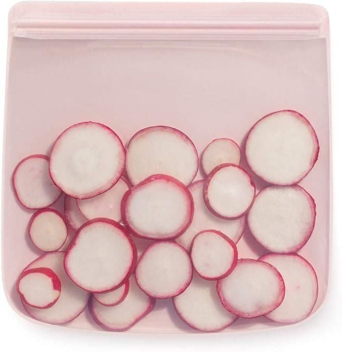 Pink reusable bag with sliced radishes.