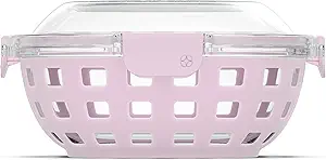 Pink silicone food container with lid.