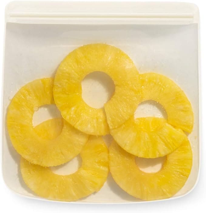 Pineapple slices in a reusable bag.