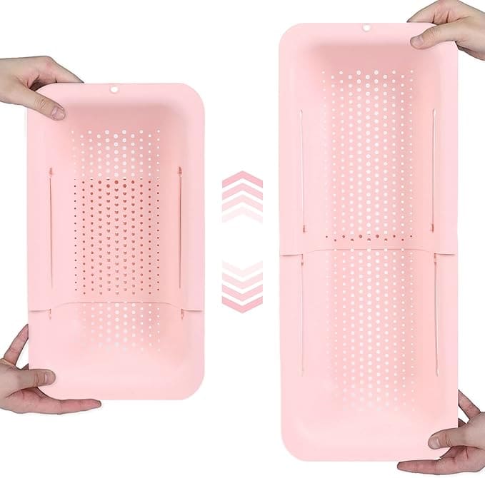 Pink collapsible plastic colander set.