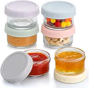 Here's an alt tag for the image: Six glass jars with silicone lids.