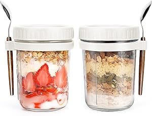 Here's an alt tag for the image: Two mason jars with breakfast parfaits.