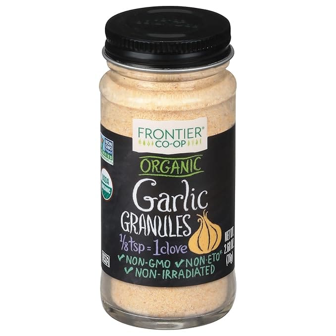 Organic garlic granules in a jar.