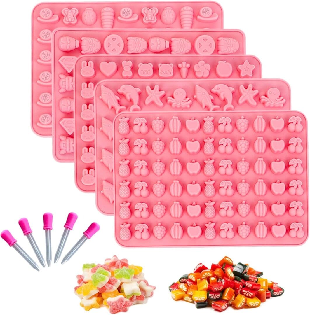 Pink silicone candy molds, gummy candies.