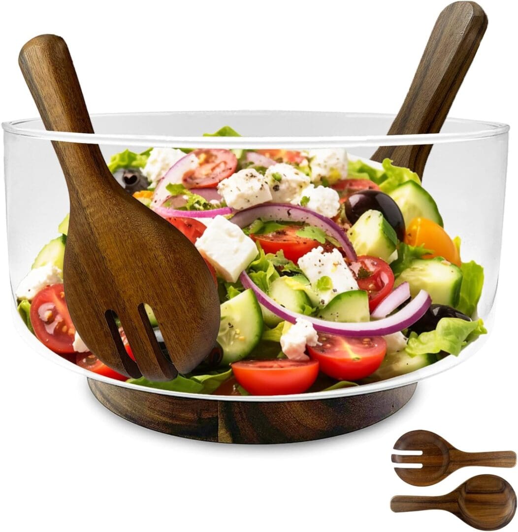 Glass salad bowl with wooden servers.