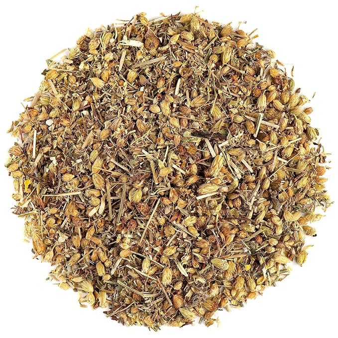 Dried herb tea blend pile.